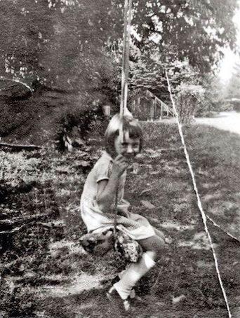 Audrey on a swing