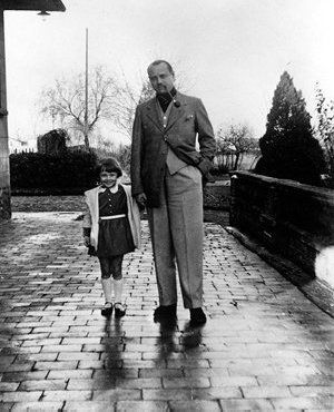 Audrey with her dad standing